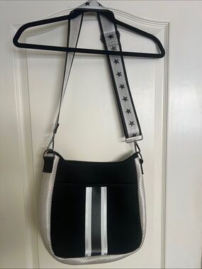 HAUTE SHORE Black and Silver Crossbody Bag with Star-Detail Strap